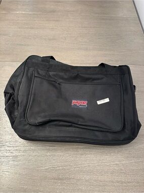 Jansport Black Duffel with Front Zip Pocket and wheels